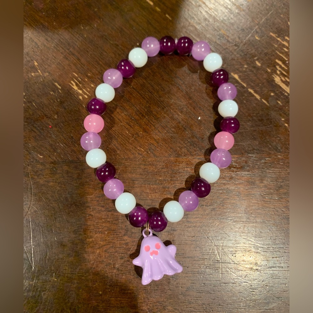 NEW HANDMADE GLASS BEAD BRACELET WITH PURPLE GHOST CHARM